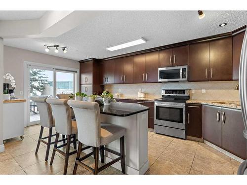 168 Edgebrook Park Nw, Calgary, AB - Indoor Photo Showing Kitchen With Stainless Steel Kitchen With Double Sink