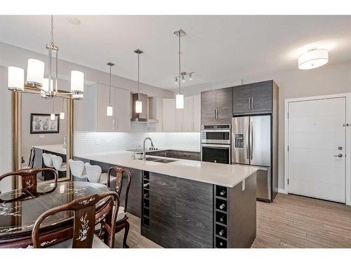 605-122 Mahogany Centre Se, Calgary, AB - Indoor Photo Showing Kitchen With Stainless Steel Kitchen With Double Sink With Upgraded Kitchen