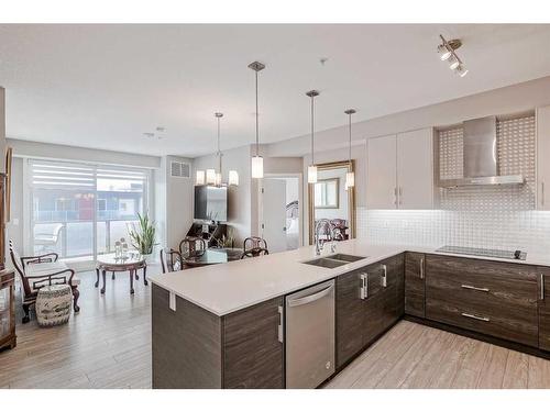 605-122 Mahogany Centre Se, Calgary, AB - Indoor Photo Showing Kitchen With Double Sink With Upgraded Kitchen