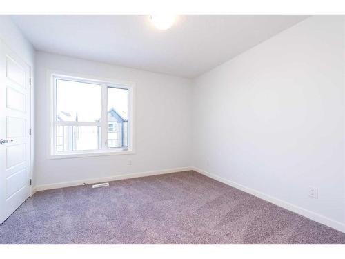 535-850 Belmont Drive Sw, Calgary, AB - Indoor Photo Showing Other Room