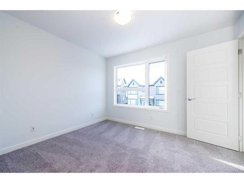 535-850 Belmont Drive Sw, Calgary, AB - Indoor Photo Showing Other Room