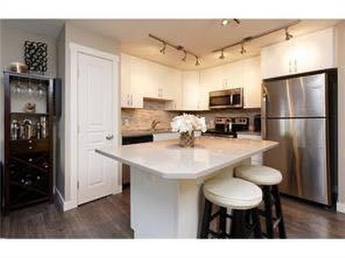 239 Mckenzie Towne Square Se, Calgary, AB - Indoor Photo Showing Kitchen With Stainless Steel Kitchen With Upgraded Kitchen