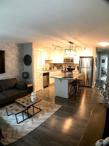 239 Mckenzie Towne Square Se, Calgary, AB - Indoor Photo Showing Living Room