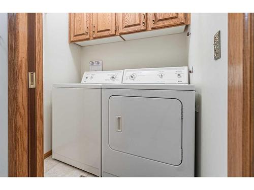 307 Hawkview Manor Circle Nw, Calgary, AB - Indoor Photo Showing Laundry Room