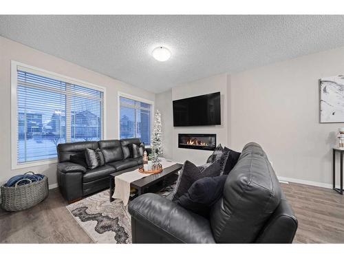 521 West Lakeview Drive, Chestermere, AB - Indoor Photo Showing Living Room With Fireplace