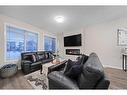 521 West Lakeview Drive, Chestermere, AB  - Indoor Photo Showing Living Room With Fireplace 