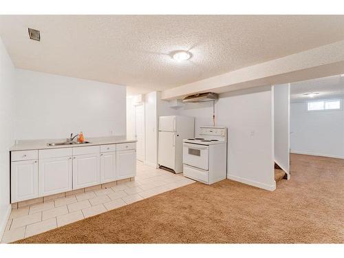 4851 Mardale Road Ne, Calgary, AB - Indoor Photo Showing Kitchen With Double Sink