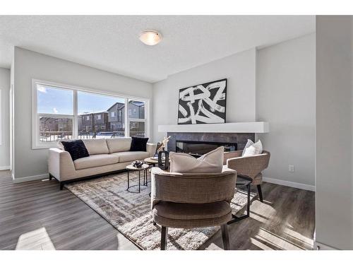 179 Wolf River Drive, Calgary, AB - Indoor Photo Showing Living Room With Fireplace