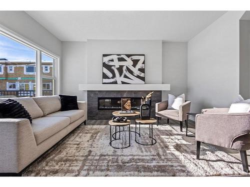 179 Wolf River Drive, Calgary, AB - Indoor Photo Showing Living Room With Fireplace