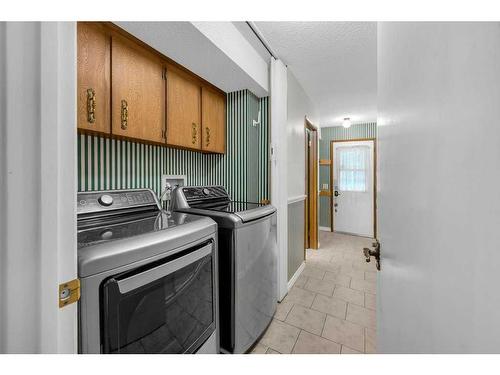 531 Ranch Estates Place Nw, Calgary, AB - Indoor Photo Showing Laundry Room