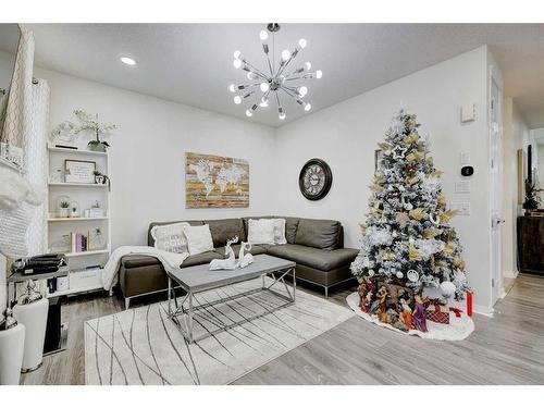 122 Osborne Rise Sw, Airdrie, AB - Indoor Photo Showing Living Room