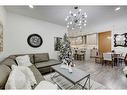 122 Osborne Rise Sw, Airdrie, AB  - Indoor Photo Showing Living Room 