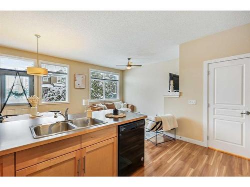 79 Panatella Hill Nw, Calgary, AB - Indoor Photo Showing Kitchen With Double Sink