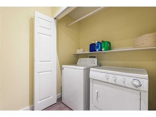 79 Panatella Hill Nw, Calgary, AB - Indoor Photo Showing Laundry Room