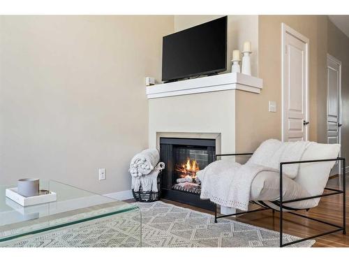 79 Panatella Hill Nw, Calgary, AB - Indoor With Fireplace