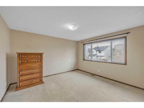 1920 New Brighton Drive Se, Calgary, AB - Indoor Photo Showing Other Room