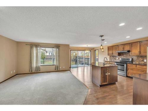 1920 New Brighton Drive Se, Calgary, AB - Indoor Photo Showing Kitchen With Stainless Steel Kitchen