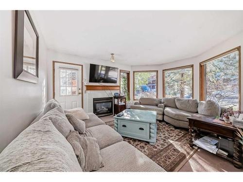 1030 Rundleview Drive, Canmore, AB - Indoor Photo Showing Living Room With Fireplace