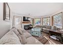 1030 Rundleview Drive, Canmore, AB  - Indoor Photo Showing Living Room With Fireplace 