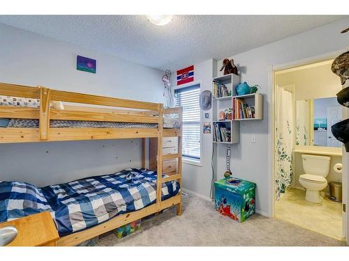 30 Covewood Place Ne, Calgary, AB - Indoor Photo Showing Bedroom