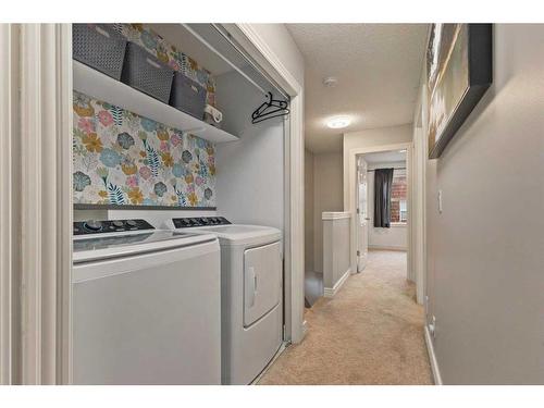 245 Bridlewood Lane Sw, Calgary, AB - Indoor Photo Showing Laundry Room