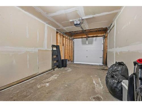 245 Bridlewood Lane Sw, Calgary, AB - Indoor Photo Showing Garage