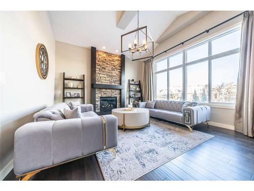 699 Cranston Avenue Se, Calgary, AB - Indoor Photo Showing Living Room With Fireplace