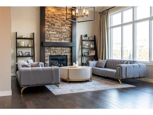 699 Cranston Avenue Se, Calgary, AB - Indoor Photo Showing Living Room With Fireplace