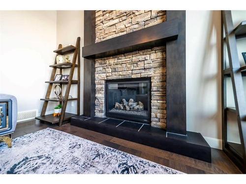 699 Cranston Avenue Se, Calgary, AB - Indoor Photo Showing Living Room With Fireplace