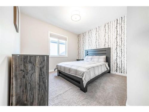 699 Cranston Avenue Se, Calgary, AB - Indoor Photo Showing Bedroom