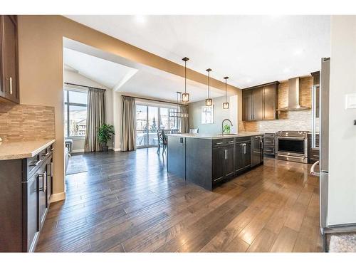 699 Cranston Avenue Se, Calgary, AB - Indoor Photo Showing Kitchen With Upgraded Kitchen