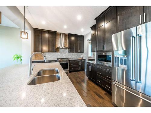 699 Cranston Avenue Se, Calgary, AB - Indoor Photo Showing Kitchen With Double Sink With Upgraded Kitchen