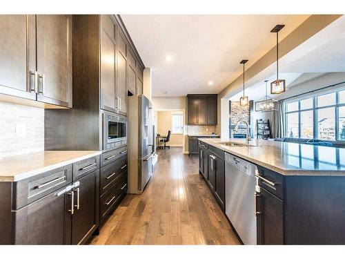 699 Cranston Avenue Se, Calgary, AB - Indoor Photo Showing Kitchen With Upgraded Kitchen