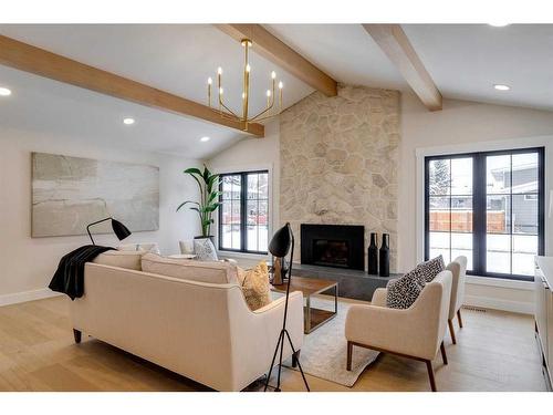 7028 Kennedy Drive Sw, Calgary, AB - Indoor Photo Showing Other Room With Fireplace