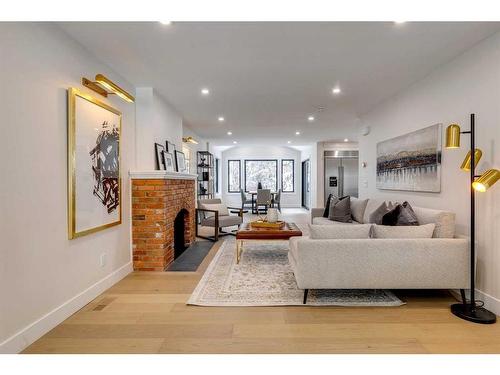 7028 Kennedy Drive Sw, Calgary, AB - Indoor Photo Showing Other Room With Fireplace