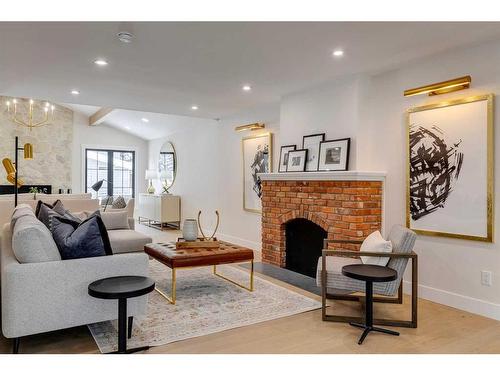 7028 Kennedy Drive Sw, Calgary, AB - Indoor Photo Showing Living Room With Fireplace