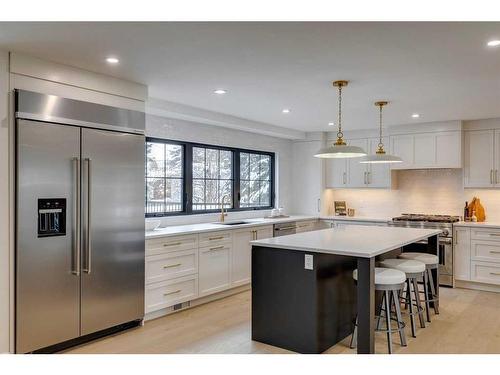 7028 Kennedy Drive Sw, Calgary, AB - Indoor Photo Showing Kitchen With Upgraded Kitchen