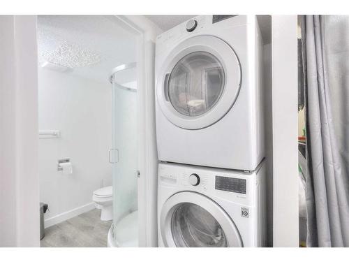 1504-11010 Bonaventure Drive Se, Calgary, AB - Indoor Photo Showing Laundry Room