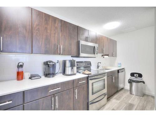 1504-11010 Bonaventure Drive Se, Calgary, AB - Indoor Photo Showing Kitchen