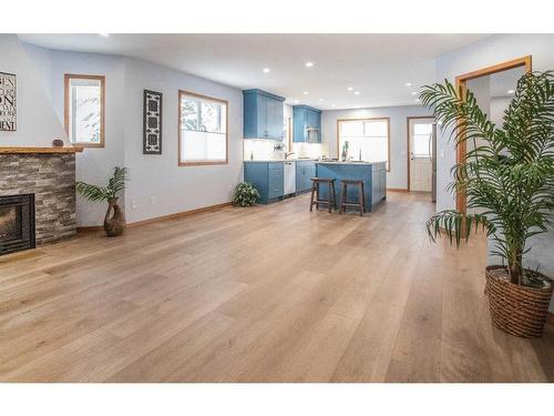 2 Cedarview Mews Sw, Calgary, AB - Indoor Photo Showing Living Room With Fireplace