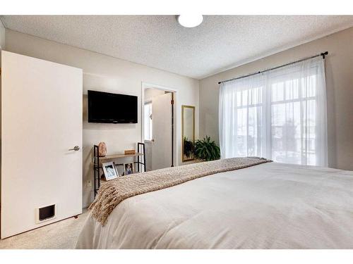 311 Mt Lorette Place Se, Calgary, AB - Indoor Photo Showing Bedroom