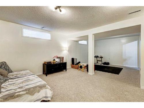 311 Mt Lorette Place Se, Calgary, AB - Indoor Photo Showing Bedroom