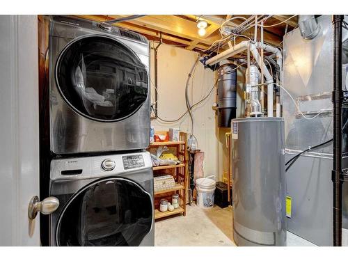 311 Mt Lorette Place Se, Calgary, AB - Indoor Photo Showing Laundry Room