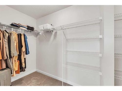 16 Masters Way Se, Calgary, AB - Indoor With Storage