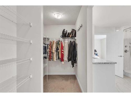 16 Masters Way Se, Calgary, AB - Indoor With Storage