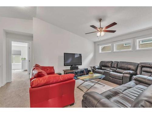 16 Masters Way Se, Calgary, AB - Indoor Photo Showing Living Room