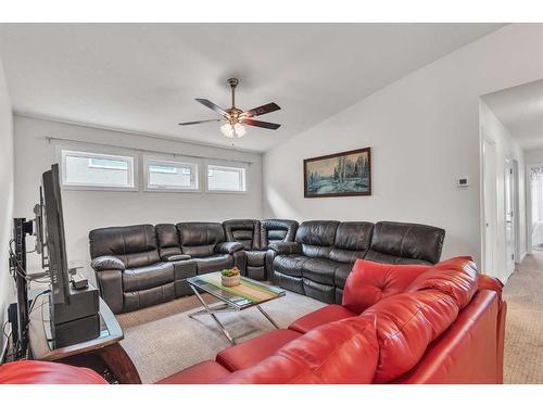 16 Masters Way Se, Calgary, AB - Indoor Photo Showing Living Room