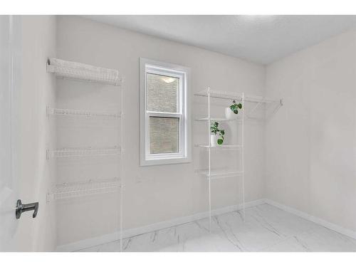 16 Masters Way Se, Calgary, AB - Indoor With Storage