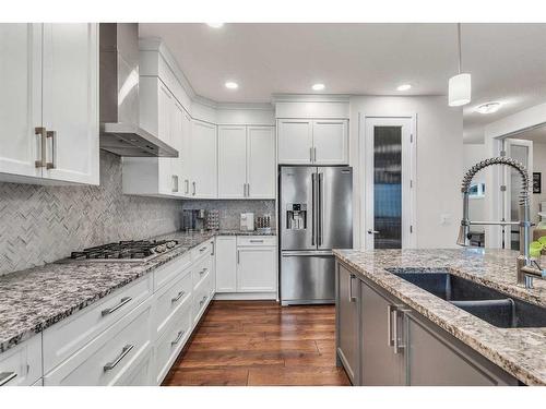 16 Masters Way Se, Calgary, AB - Indoor Photo Showing Kitchen With Double Sink With Upgraded Kitchen