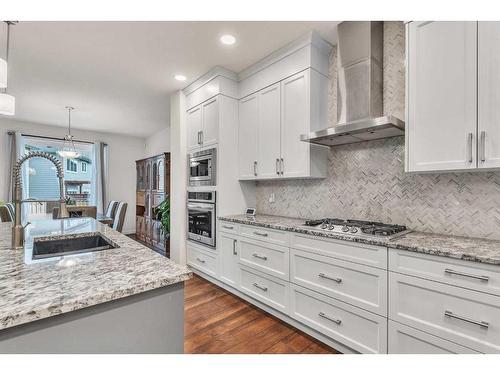 16 Masters Way Se, Calgary, AB - Indoor Photo Showing Kitchen With Upgraded Kitchen